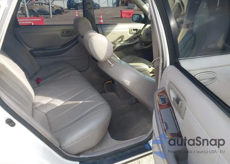 1998 Toyota Avalon Xl z USA, uszkodzony, nr VIN 4T1BF18B3WU253541